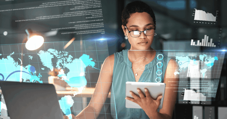 Profissional analisando dados digitais em ambiente tecnológico com gráficos e mapas virtuais, simbolizando o uso de tecnologias emergentes para inovação e transformação digital.